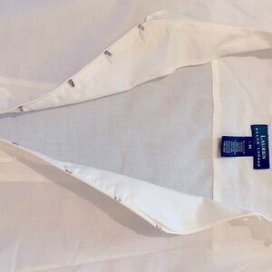 Ralph Lauren white long sleeve blouse. 100% cotton with ruffles and clasps down.